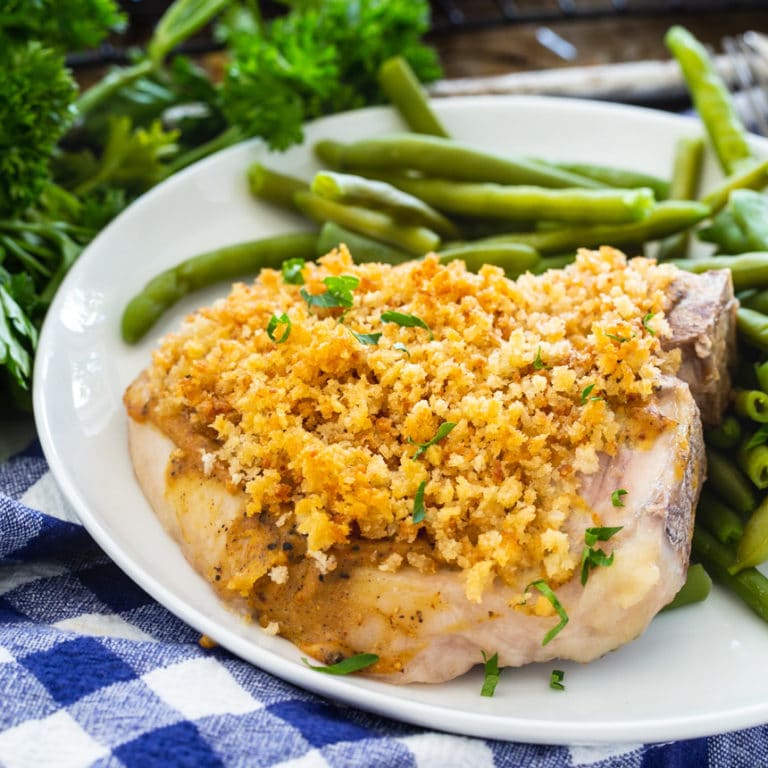 Deviled Pork Chops are coated with a Dijon mustard based paste and sprinkled with buttery Panko crumbs